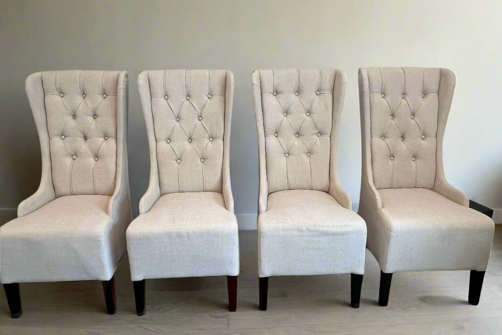 Elegant wing-backed slipper chair with sparkly buttons